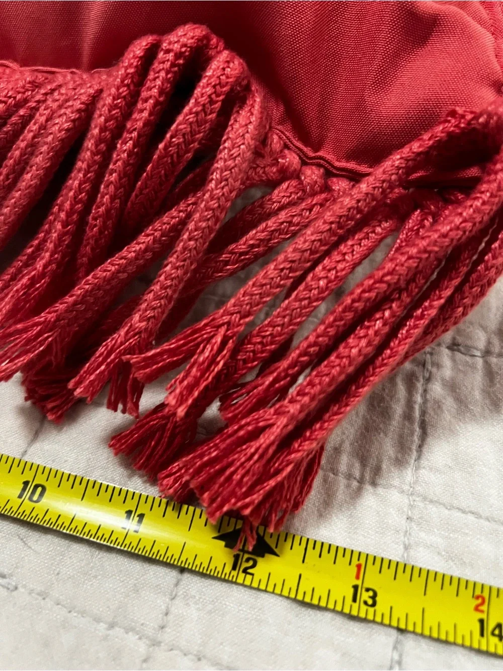 Textured macrame coral pillow